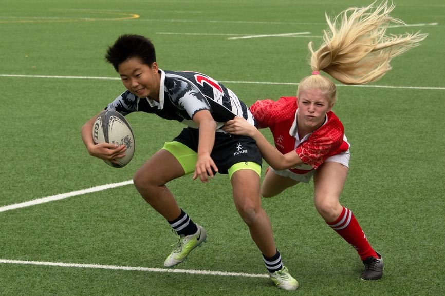 Under-16 girls playing rugby in Hong Kong at the 2019 New Year's Day tournament