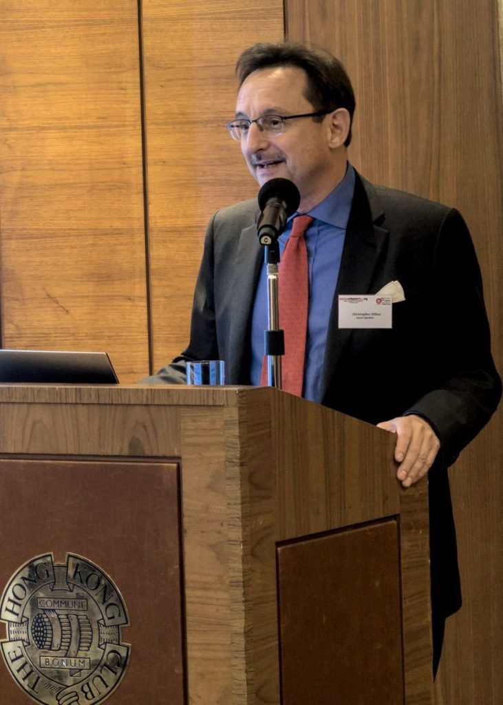 Christopher Dillon speaking at an event organized by the Swiss Chamber of Commerce at the Hong Kong Club in 2018.