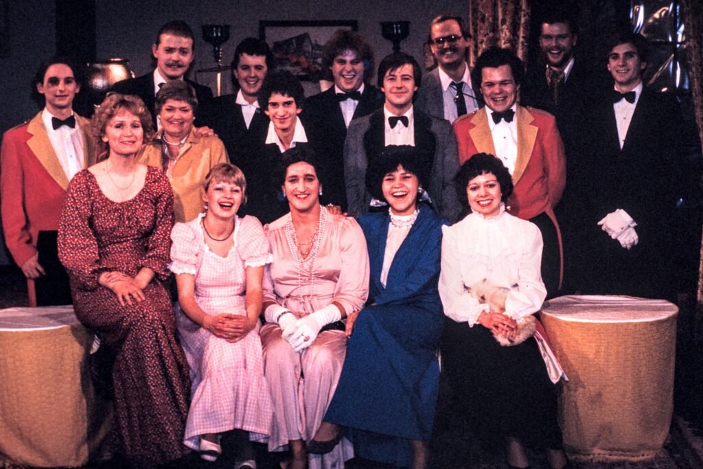 The cast of the stage play "The Peacock Season," with instructors Kay Greaves and Dean Patterson